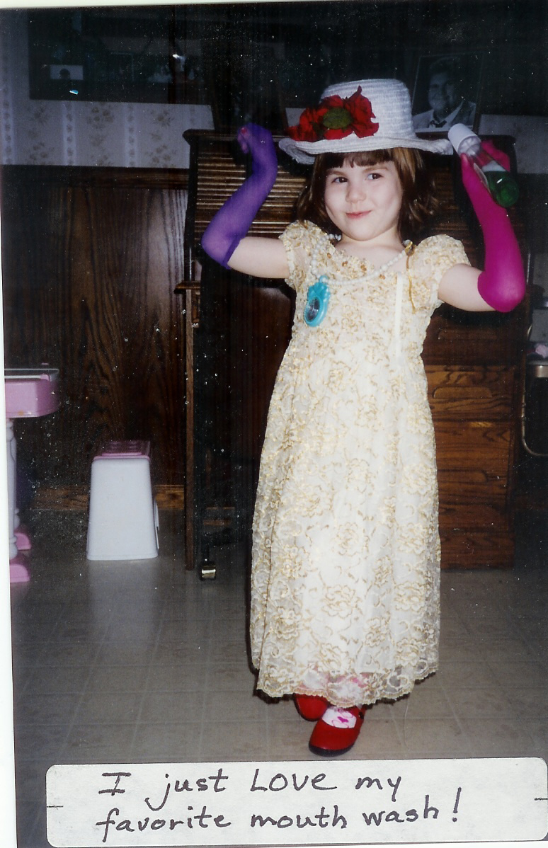 A photo of the blogger as a child in costume with the caption "I just LOVE my favorite mouth wash!"
