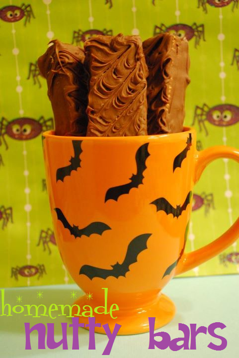 Homemade nutty bars in a orange mug with bats on it