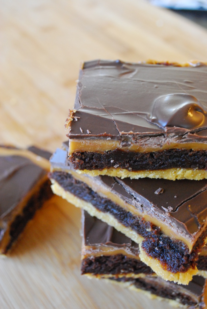 Close-up of a stack of Twix brownies with another single brownie