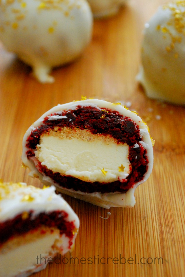 red velvet cheesecake brownie bombs closeup interior of the brownie bomb on a wood background