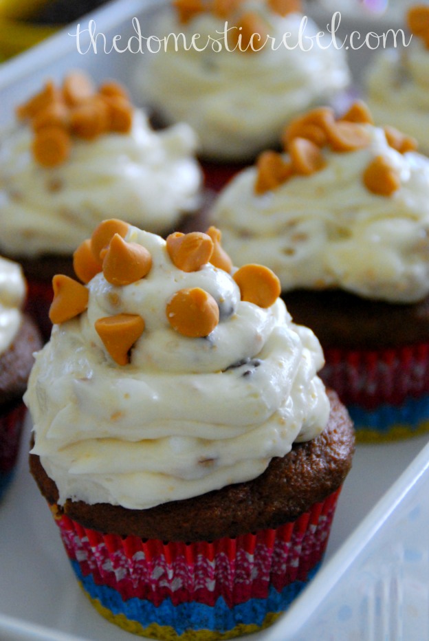 seven layer bar cupcakes arranged in a white dish