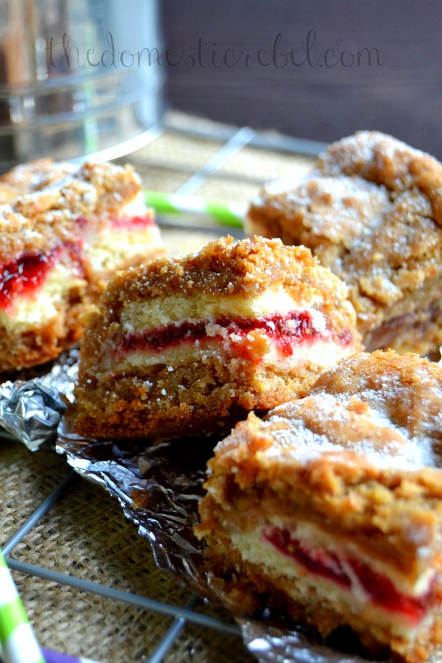 oatmeal cookie peanut butter and jelly donut bars arranged on a wire cooling rack
