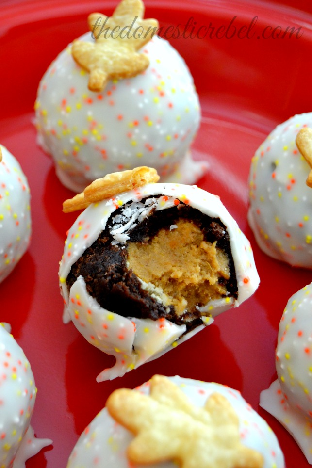 pumpkin pie brownie bombs with bite removed on a red plate