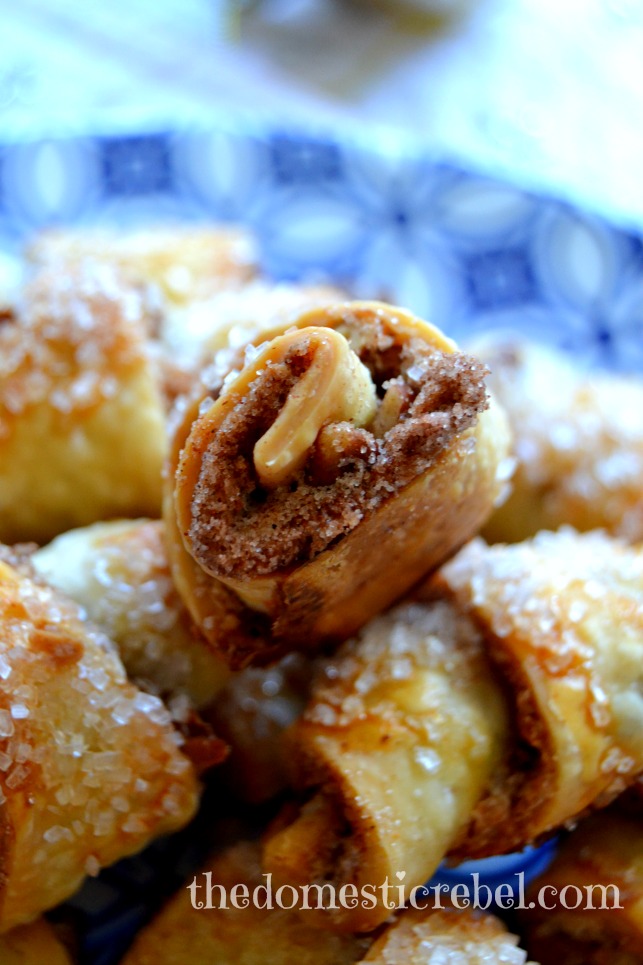 gingerbread biscoff rugelach cookies close up on blue and white plate