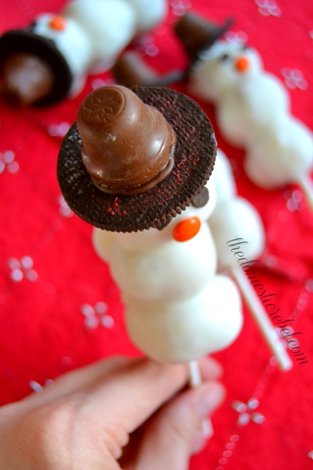 snowman donut pops photo of candy top hat