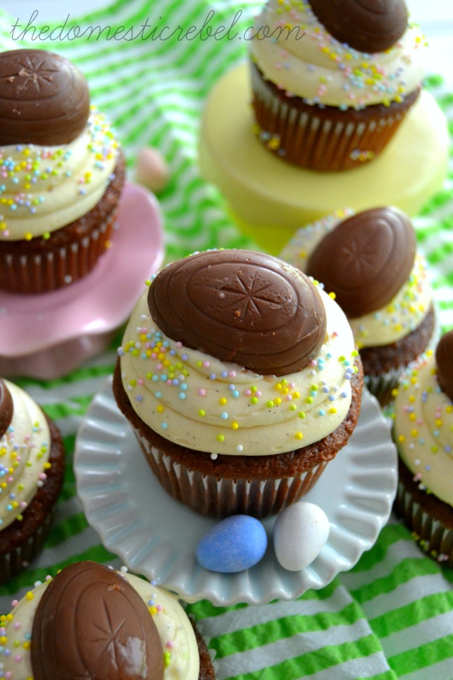 vanilla bean cadbury creme cupcakes arranged on pastel cake stands