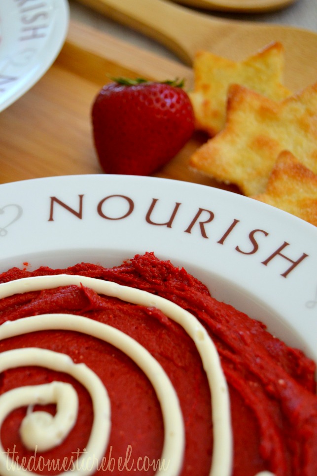 red velvet dessert dip recipe close-up in a bowl that says "nourish"