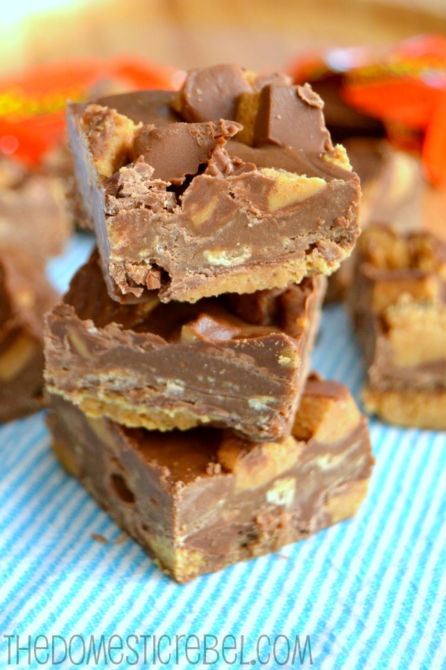 reese's peanut butter cup fudge pieces stacked on blue towel