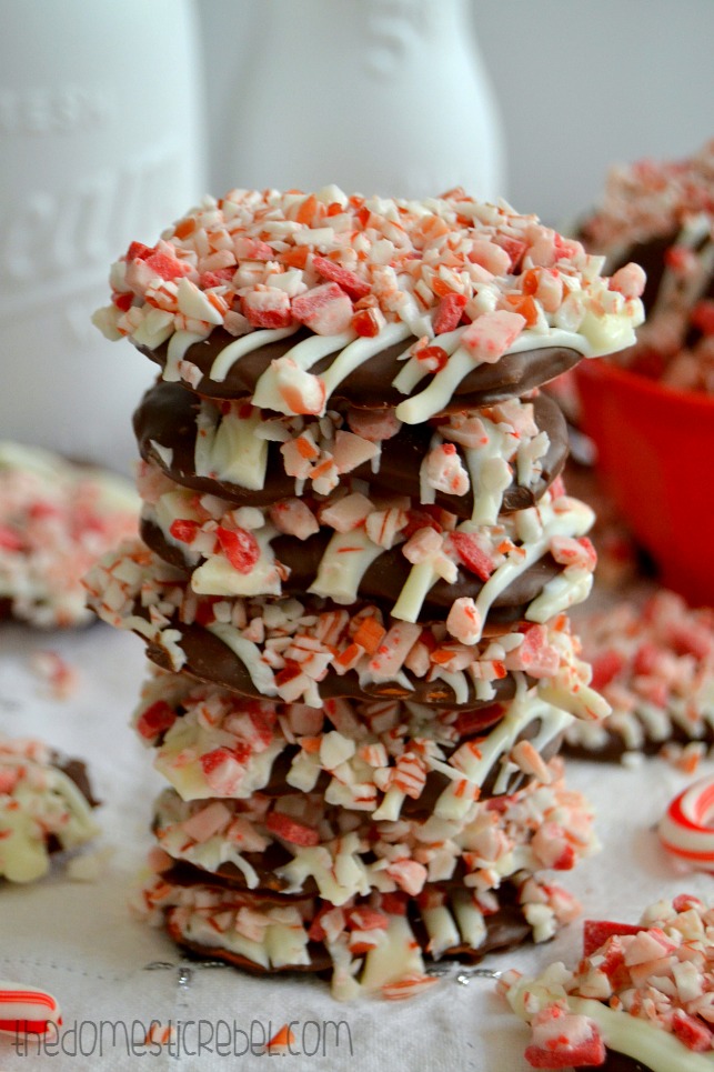 Peppermint Crunch Pretzels stacked tall on white background