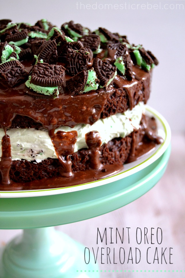 Mint Oreo Overload Cake sitting on green cake stand