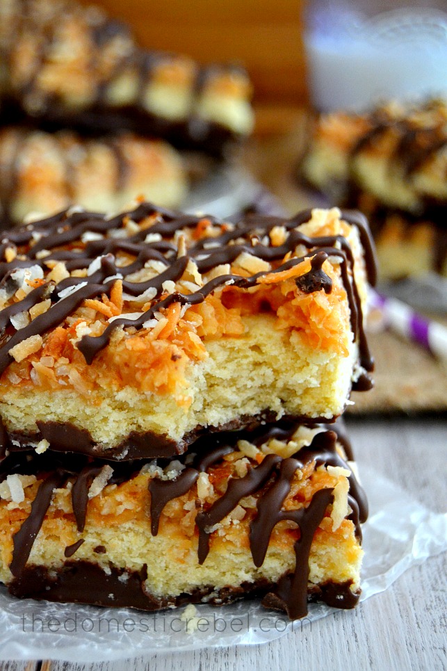 sugar cookie samoas bars stacked x2 on parchment paper
