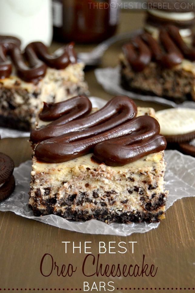 oreo cheesecake bars arranged with oreo cookies on wood background