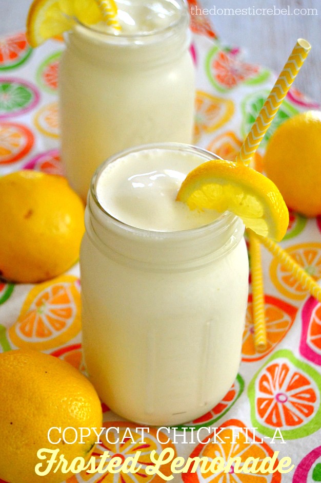 Copycat Chick-Fil-A Frosted Lemonade in glasses with lemon slices and yellow straws