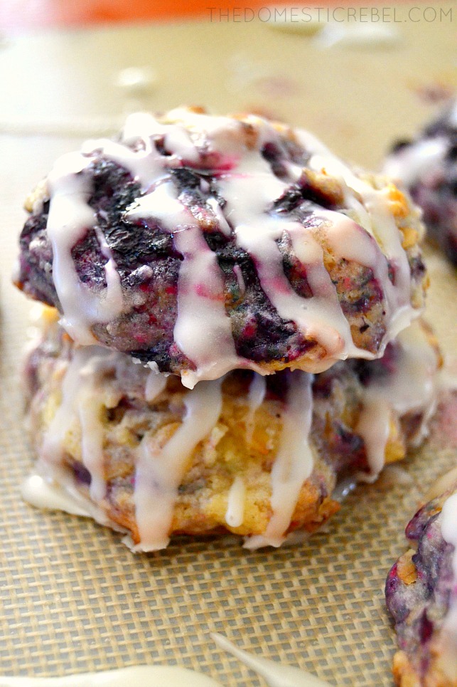 blueberry streusel cookies stacked on baking sheet
