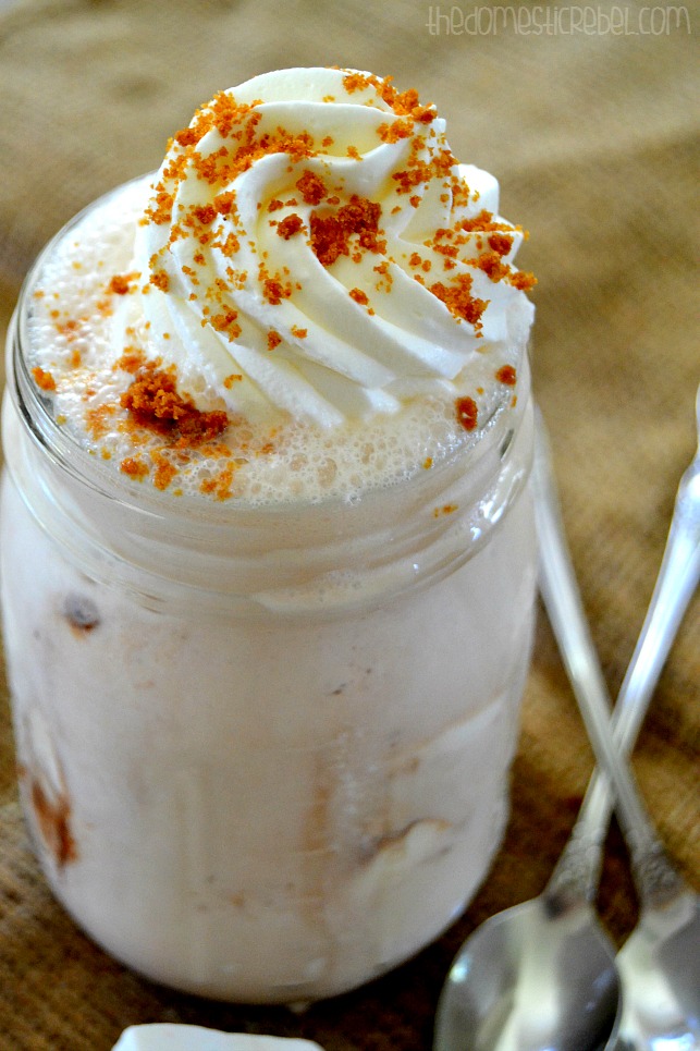 copycat s'mores frappuccino closeup of whipped cream on burlap with spoons