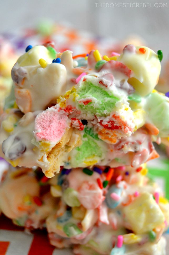 tutti-frutti cookie clusters stacked with bite removed
