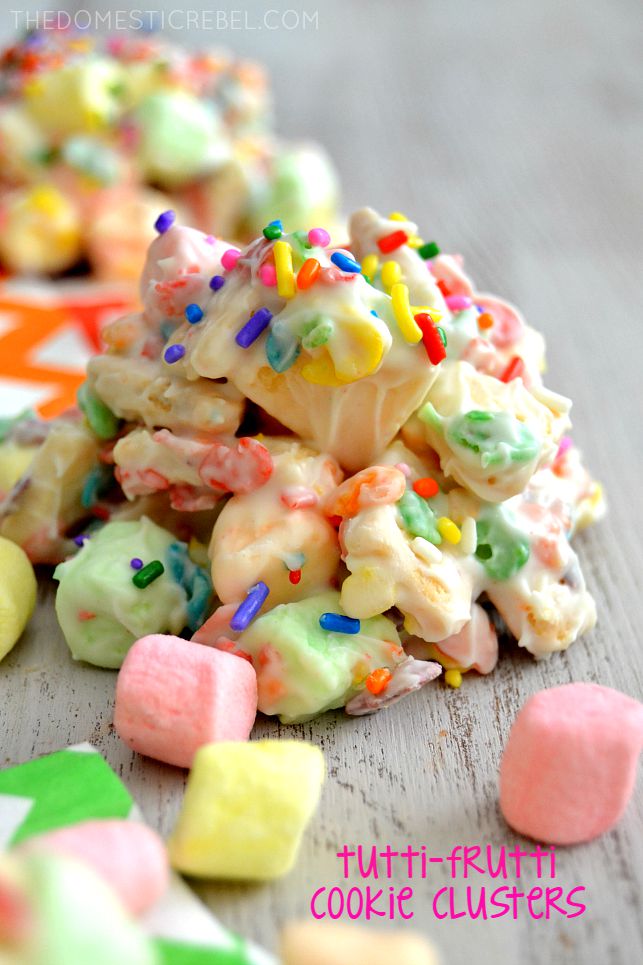 tutti-frutti cookie clusters on white background with mini marshmallows