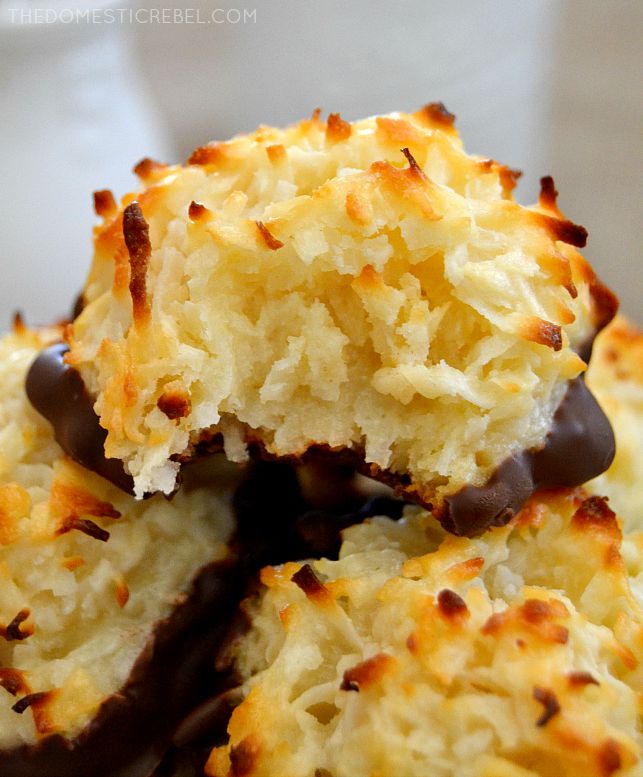 Coconut Macaroons arranged in pile with a bite missing