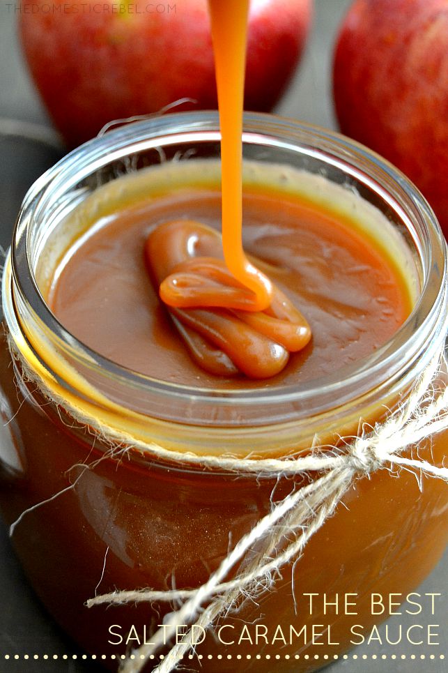 Salted Caramel Sauce in jar with apples in background