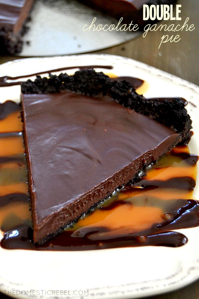 double chocolate ganache pie on white plate with caramel and chocolate sauce drizzle