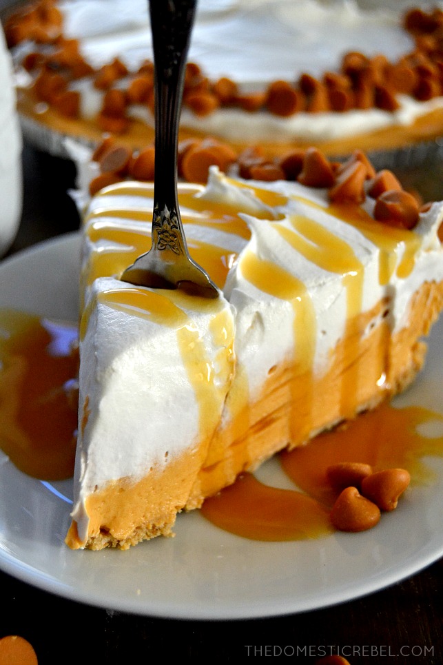 Butterscotch Pie slice on white plate with fork and caramel drizzle