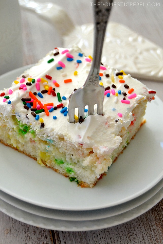 Skinny Funfetti Cake on white plates with fork in it