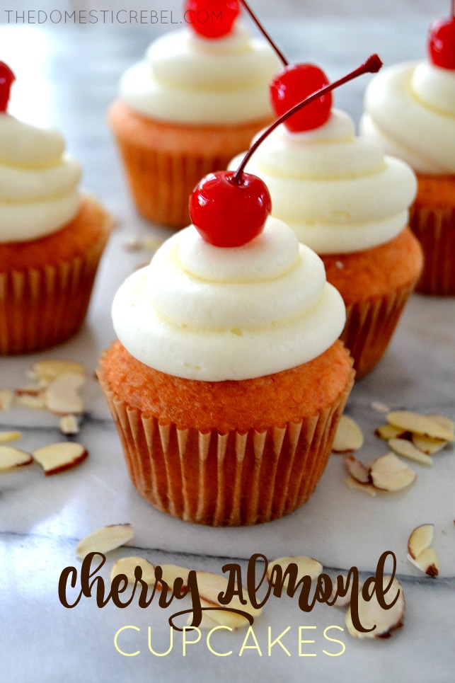 Cherry Almond Cupcakes arranged on marble slab with almond slices
