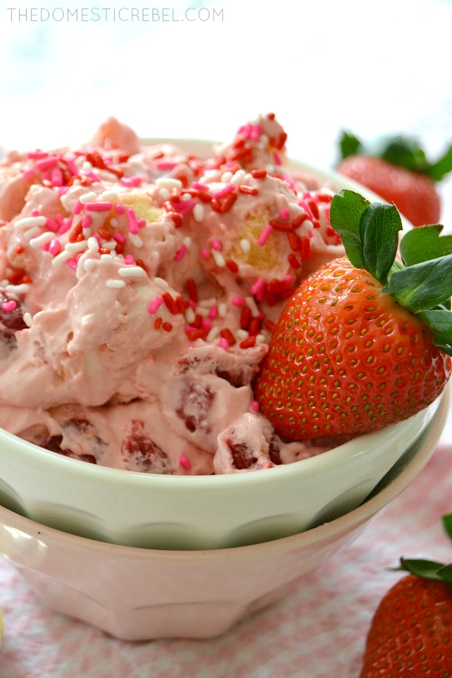 Closeup of Strawberry Shortcake Fluff in two bowls with fresh strawberry