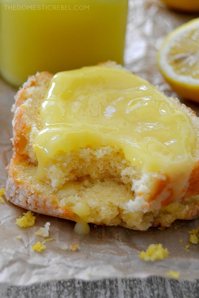 Closeup of pound cake smeared with Lemon Curd on parchment paper