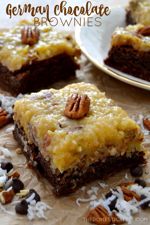 German Chocolate Brownies arranged on parchment with coconut, pecans and chocolate chips