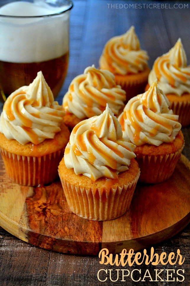 Butterbeer Cupcakes arranged on wood board with cream soda in background