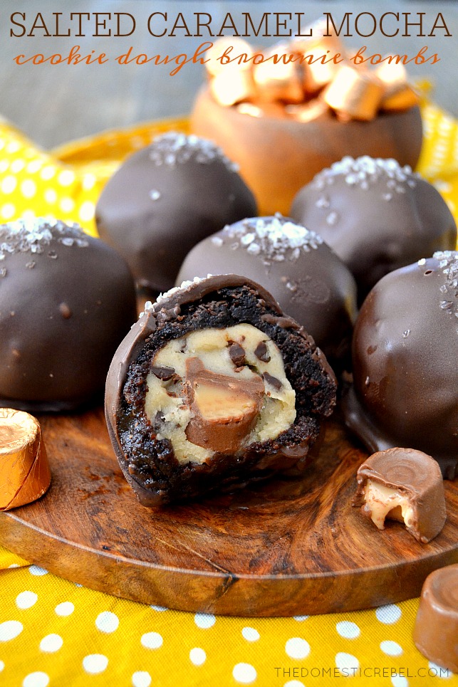 Salted Caramel Mocha Brownie Bombs arranged on wood board with candy