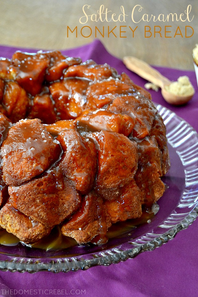 Salted Caramel Monkey Bread on glass plate with purple fabric