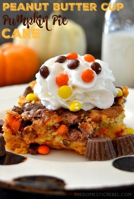 Peanut Butter Cup Pumpkin Pie Cake: a delightful mash-up between creamy pumpkin pie and fluffy cake that's studded with rich and gooey peanut butter cups and Reese's Pieces candies! A wonderful fall-favorite that's so easy to prepare!