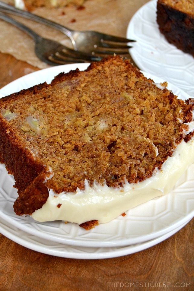gingerbread banana bread slice on white plates with forks