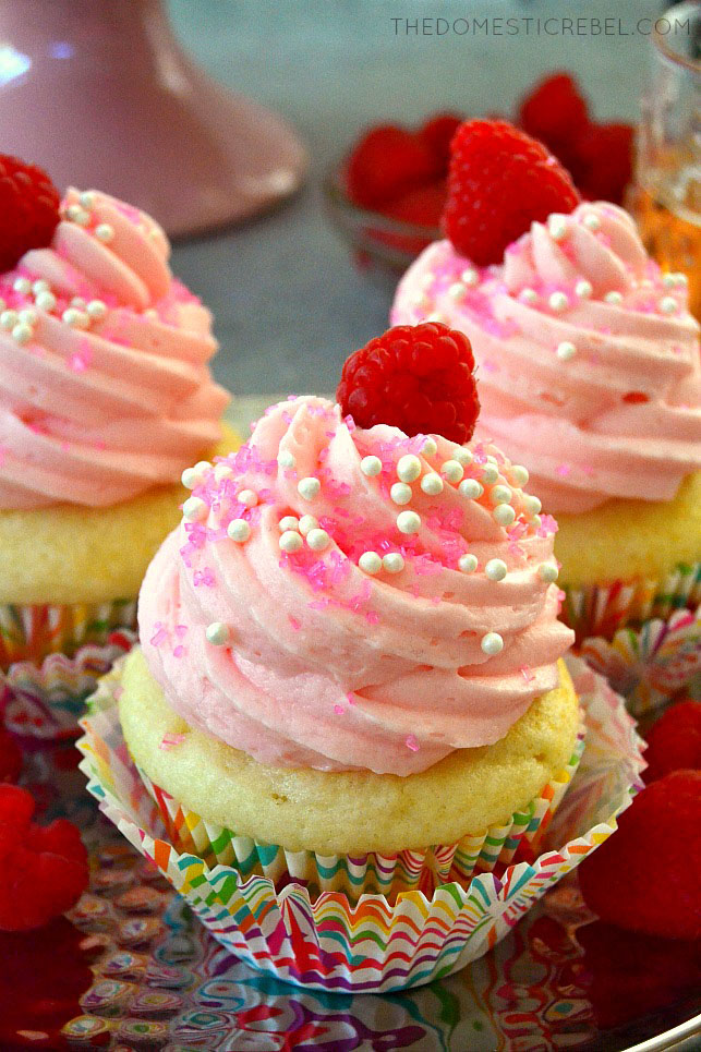 pink champagne cupcakes with raspberries