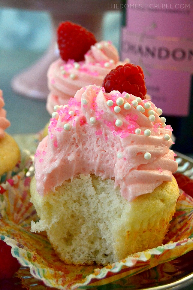 pink champagne cupcakes with bite missing