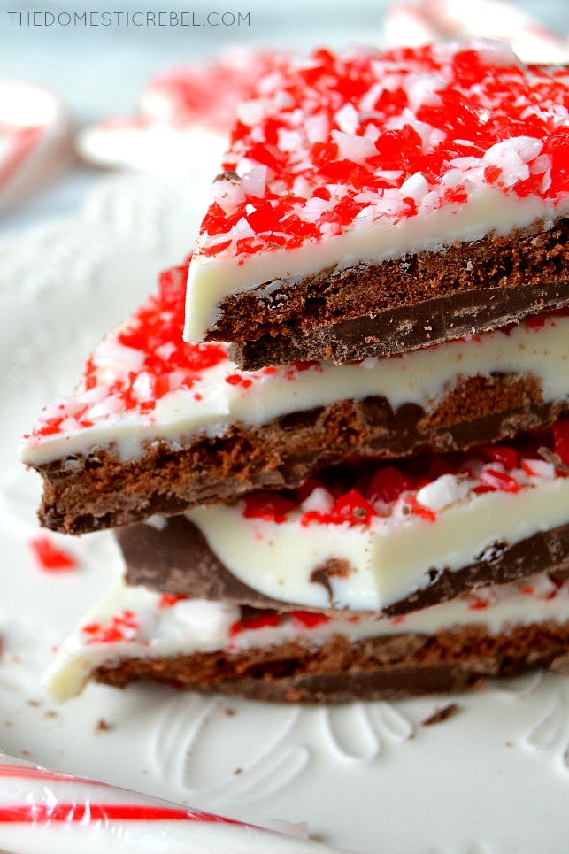closeup stack of brownie brittle peppermint bark on white plate