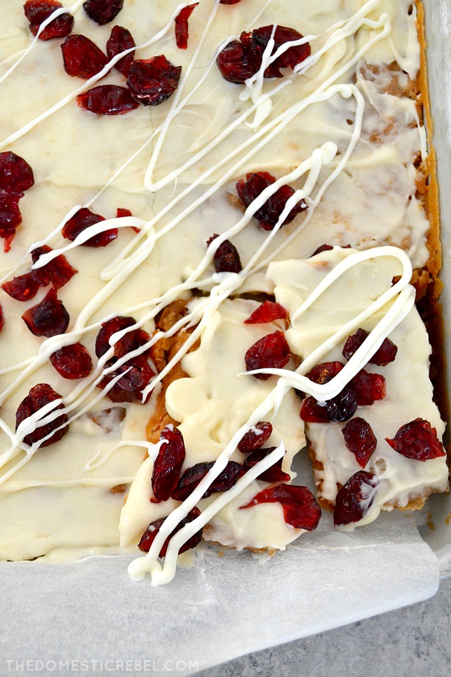 cranberry bliss cracker toffee in parchment pan