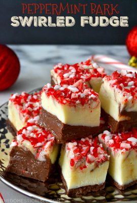 This Peppermint Bark Fudge is such a simple dessert to whip up during the holidays! Soft, chewy, creamy, melt-in-your-mouth chocolate and vanilla swirled fudge with crunchy peppermint bits on top. A must make for a holiday party or cookie tray!