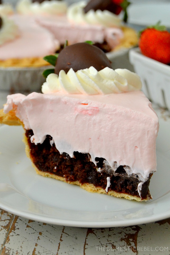 a slice of chocolate covered strawberry brownie pie without a chocolate drizzle.