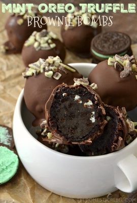 These MINT OREO TRUFFLE BROWNIE BOMBS are a minty delight! No-bake mint Oreo truffles wrapped in a fudgy baked brownie and coated in chocolate & Andes Mints. So simple to whip up and a great way to impress anyone you serve!