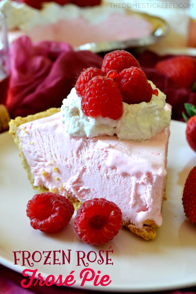 SLICE OF FROZEN ROSE PIE ON A WHITE PLATE WITH RASPBERRIES