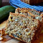 This is the BEST recipe for Zucchini Bread EVER! Studded with buttery walnuts, this perfectly spiced, moist & tender zucchini bread is packed with flavor and is SO EASY!