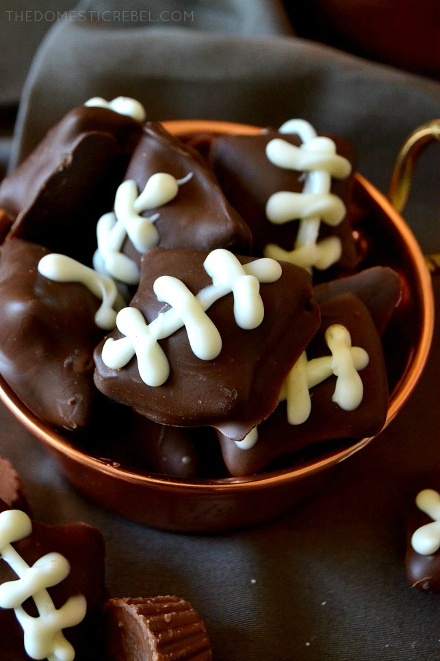 CHOCOLATE COVERED PRETZELS DECORATED LIKE FOOTBALLS