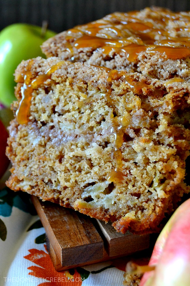 CLOSE UP OF A SLICE OF APPLE BREAD WITH CARAMEL DRIZZLE