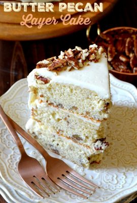 This Butter Pecan Layer Cake is as tasty as it is pretty! Three towering layers of moist buttery, toasted pecan cake with a delicious cream cheese frosting. Easy, impressive and SCRUMPTIOUS!