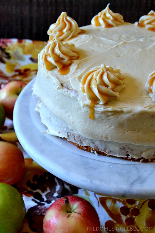 whole caramel apple layer cake on a marble cake stand 