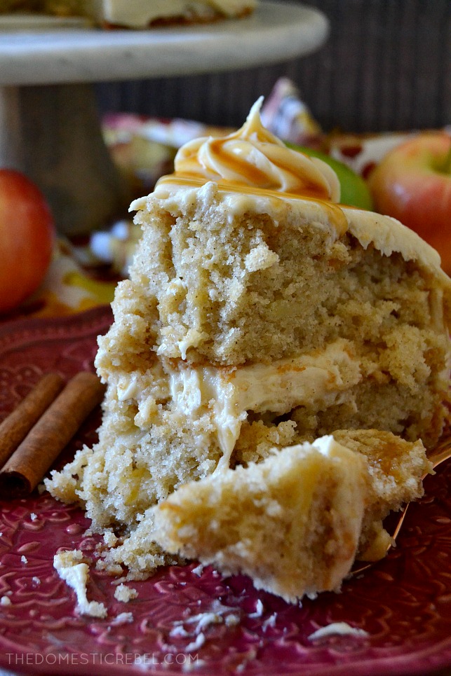 slice of caramel apple layer cake with a bite missing