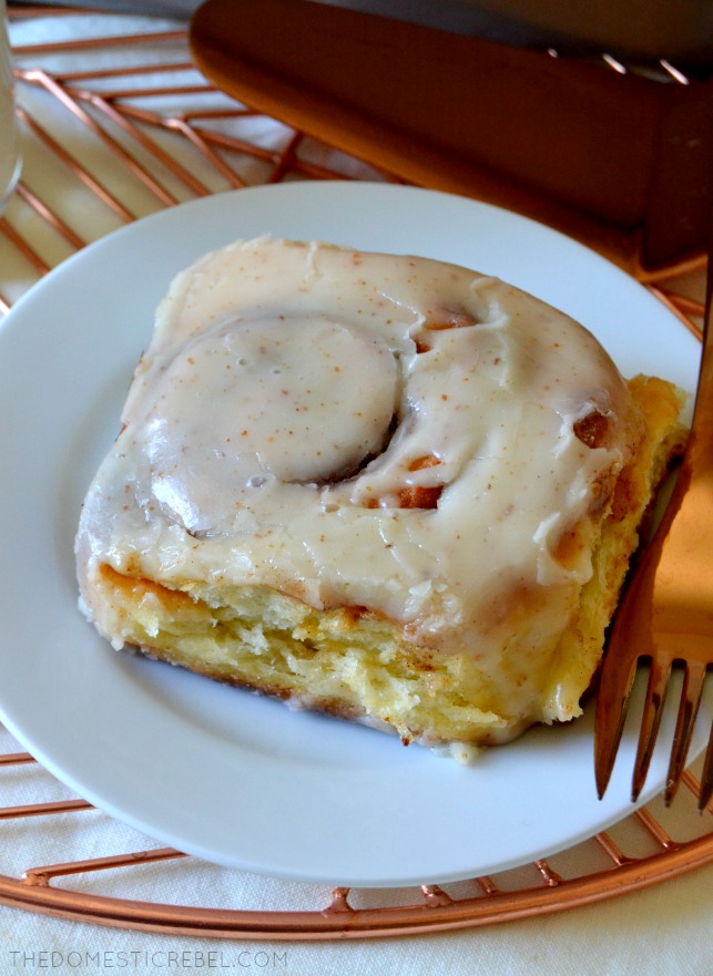 cinnamon roll on a small, white plate